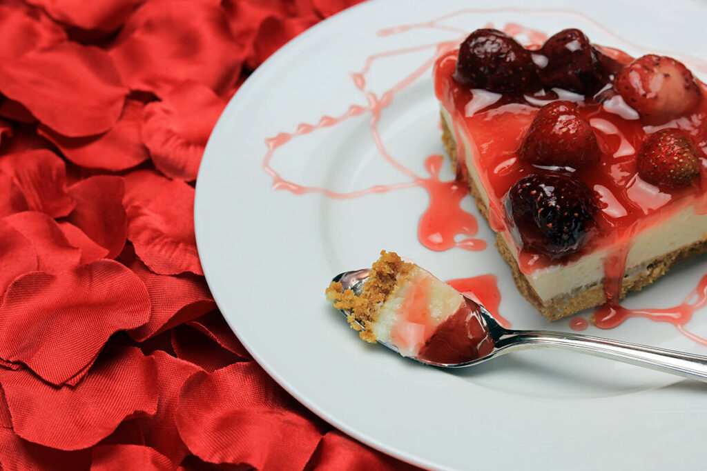 Heart shaped cheesecake with strawberries